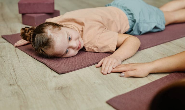 Girl with Down Syndrome in Fitness Therapy